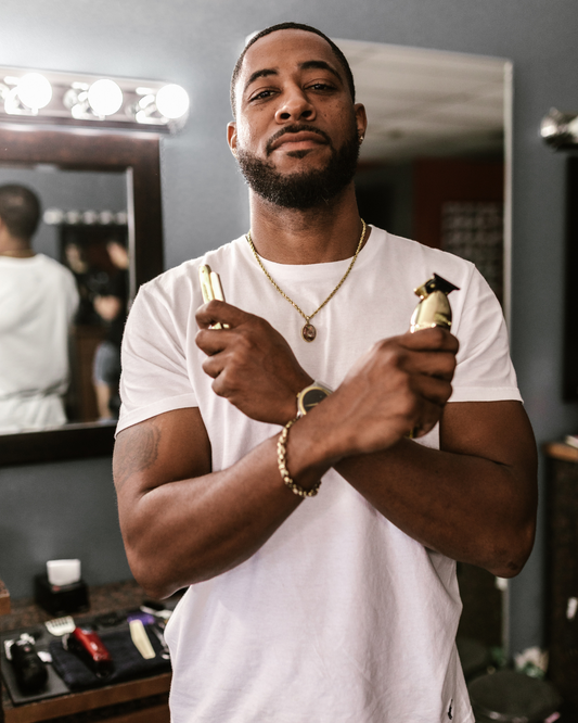 black man holding straight razor