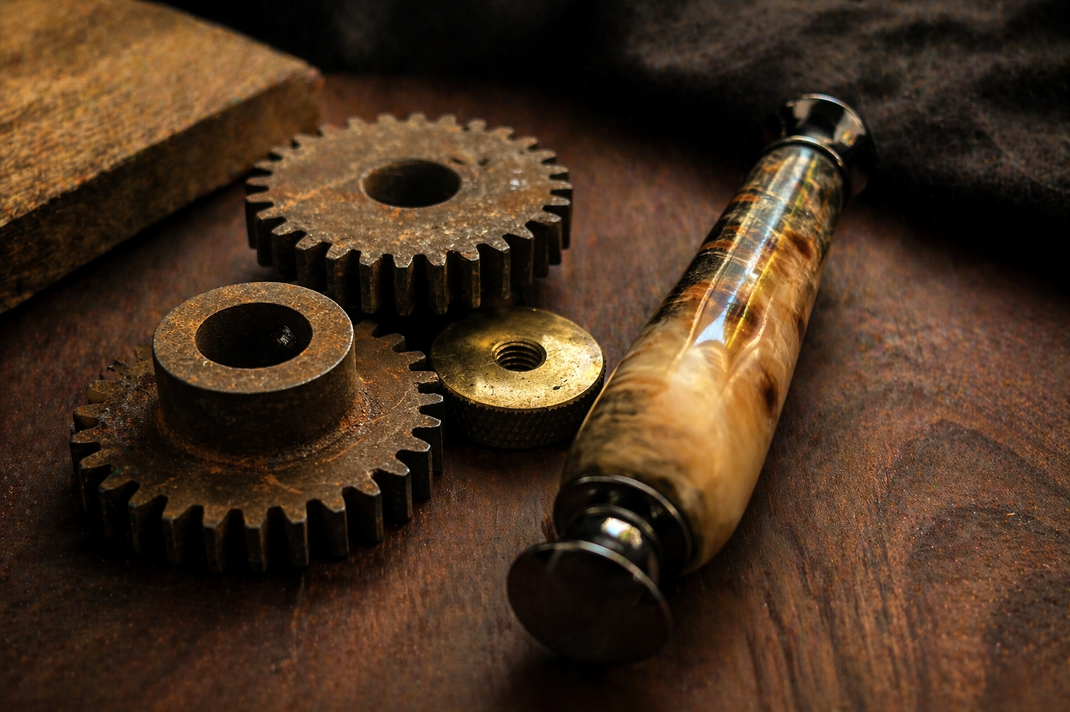 detail of a wooden razor handle with brass gears in a craftsmen studio 