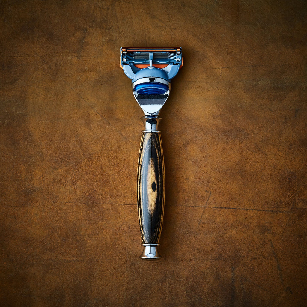 classic shaving razor in black and white ebony wood